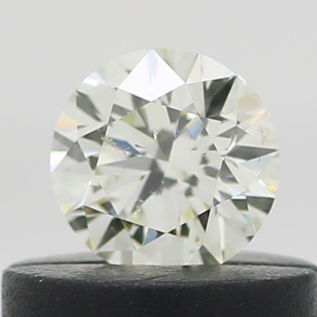 Loose Diamond - ROUND 0.3ct N SI2: Loose Diamond - ROUND 0.3ct N SI2 Source: Natural Shape: ROUND Carats: 0.3 Color: N Clarity: SI2 Certification: NONE Video: