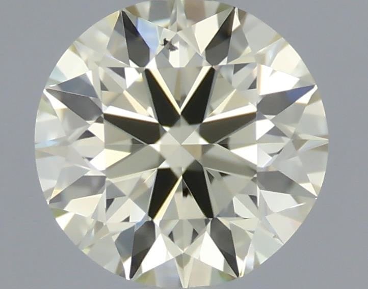 Loose Diamond - ROUND 0.37ct O-P VS2: Loose Diamond - ROUND 0.37ct O-P VS2 Source: Natural Shape: ROUND Carats: 0.37 Color: O-P Certification: IGI Video: