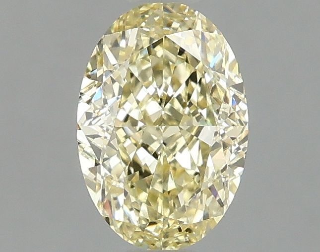 Loose Diamond - OVAL 1.09ct Fancy Yellow VVS2: Loose Diamond - OVAL 1.09ct Fancy Yellow VVS2 Source: This is a real non-mined Diamond that has been grown in a lab Shape: OVAL Carats: 1.09 Color: Fancy Yellow Certification: IGI Video: