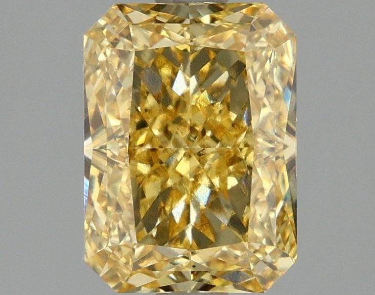 Loose Diamond - RADIANT 2.1ct Fancy Vivid Yellow VS1: Loose Diamond - RADIANT 2.1ct Fancy Vivid Yellow VS1 Source: This is a real non-mined Diamond that has been grown in a lab Shape: RADIANT Carats: 2.1 Color: Fancy Vivid Yellow Certification: IGI Video