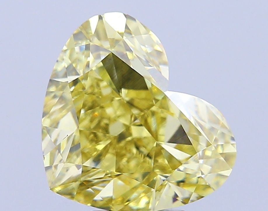 Loose Diamond - HEART 7.05ct Fancy Vivid Yellow VVS2: Loose Diamond - HEART 7.05ct Fancy Vivid Yellow VVS2 Source: This is a real non-mined Diamond that has been grown in a lab Shape: HEART Carats: 7.05 Color: Fancy Vivid Yellow Certification: IGI Video: