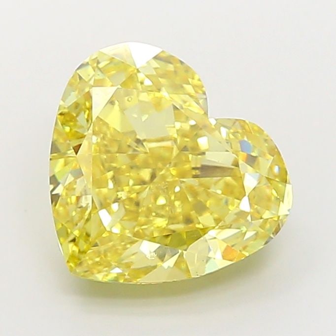 Loose Diamond - HEART 8.34ct Fancy Vivid Yellow VS2: Loose Diamond - HEART 8.34ct Fancy Vivid Yellow VS2 Source: This is a real non-mined Diamond that has been grown in a lab Shape: HEART Carats: 8.34 Color: Fancy Vivid Yellow Certification: IGI The Dia