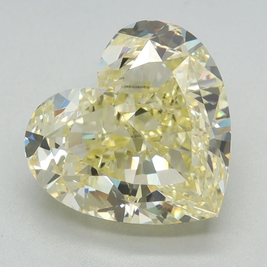Loose Diamond - HEART 2.74ct Fancy Yellow VS1: Loose Diamond - HEART 2.74ct Fancy Yellow VS1 Source: This is a real non-mined Diamond that has been grown in a lab Shape: HEART Carats: 2.74 Color: Fancy Yellow Certification: IGI Video: