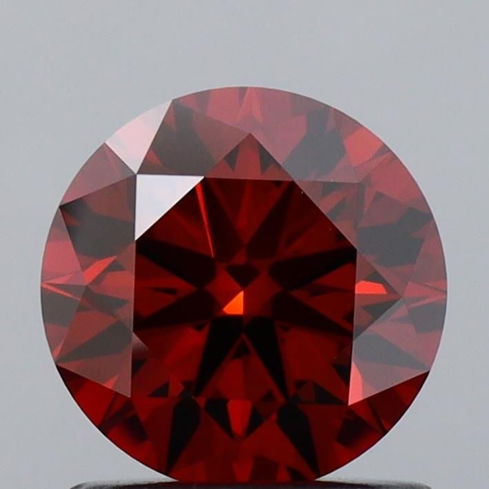 Loose Diamond - ROUND 0.95ct Fancy Deep Orange VVS2: Loose Diamond - ROUND 0.95ct Fancy Deep Orange VVS2 Source: This is a real non-mined Diamond that has been grown in a lab Shape: ROUND Carats: 0.95 Color: Fancy Deep Orange Certification: IGI Video: