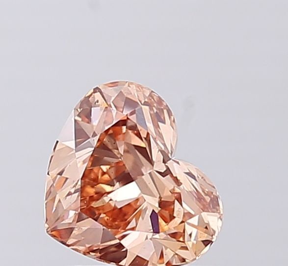 Loose Diamond - HEART 1.04ct Fancy Light Brown VS2: Loose Diamond - HEART 1.04ct Fancy Light Brown VS2 Source: This is a real non-mined Diamond that has been grown in a lab Shape: HEART Carats: 1.04 Color: Fancy Light Brown Certification: IGI Video: