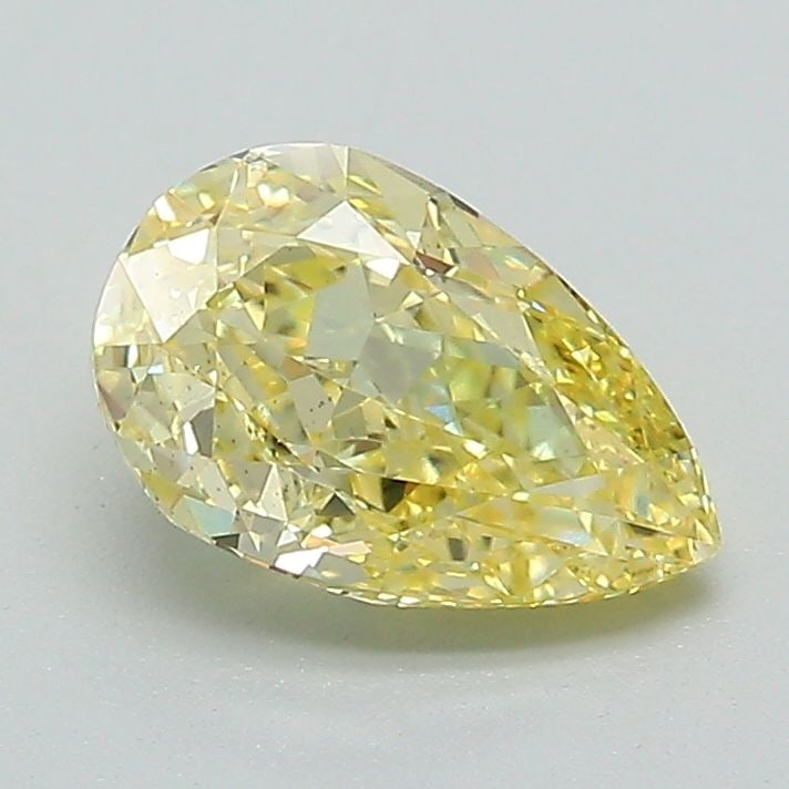 Loose Diamond - PEAR 1.22ct Fancy Vivid Yellow VS1: Loose Diamond - PEAR 1.22ct Fancy Vivid Yellow VS1 Source: This is a real non-mined Diamond that has been grown in a lab Shape: PEAR Carats: 1.22 Color: Fancy Vivid Yellow Certification: IGI Video: