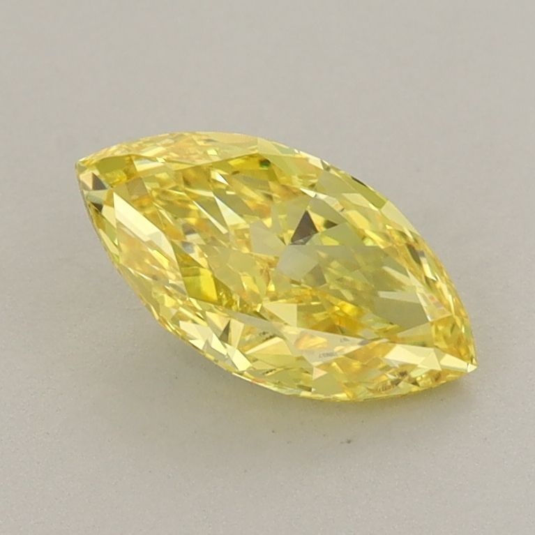 Loose Diamond - MARQUISE 0.91ct Fancy Vivid Yellow VVS2: Loose Diamond - MARQUISE 0.91ct Fancy Vivid Yellow VVS2 Source: This is a real non-mined Diamond that has been grown in a lab Shape: MARQUISE Carats: 0.91 Color: Fancy Vivid Yellow Certification: IGI 