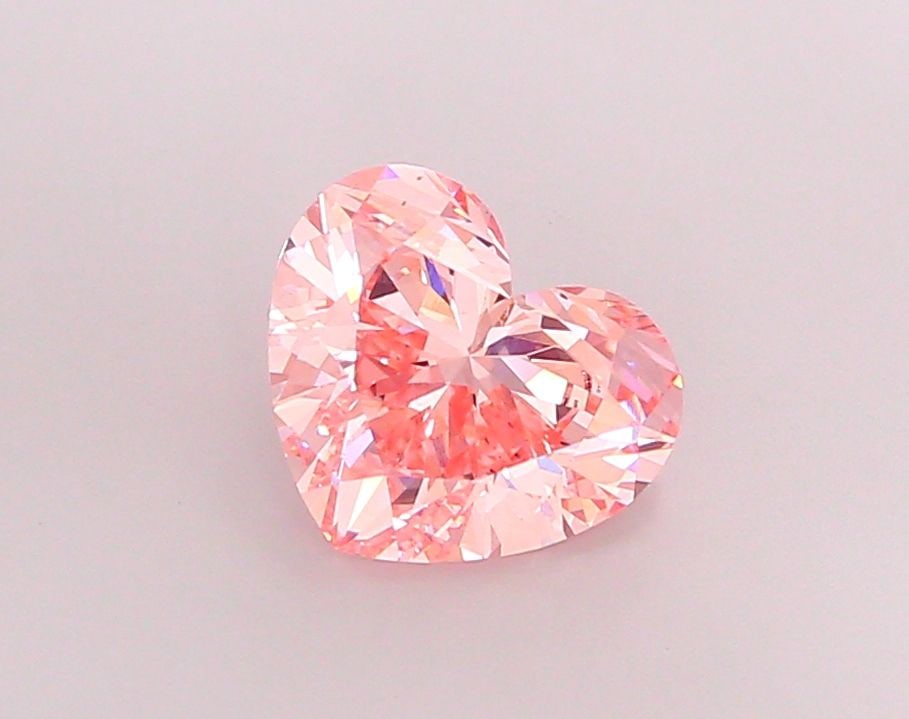 Loose Diamond - HEART 3.98ct Fancy Vivid Pink VS1: Loose Diamond - HEART 3.98ct Fancy Vivid Pink VS1 Source: This is a real non-mined Diamond that has been grown in a lab Shape: HEART Carats: 3.98 Color: Fancy Vivid Pink Certification: IGI Video: