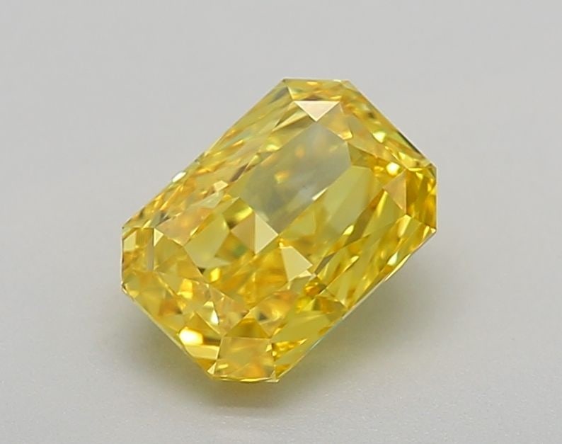 Loose Diamond - RADIANT 1.01ct Fancy Vivid Yellow VS1: Loose Diamond - RADIANT 1.01ct Fancy Vivid Yellow VS1 Source: This is a real non-mined Diamond that has been grown in a lab Shape: RADIANT Carats: 1.01 Color: Fancy Vivid Yellow Certification: IGI Vid
