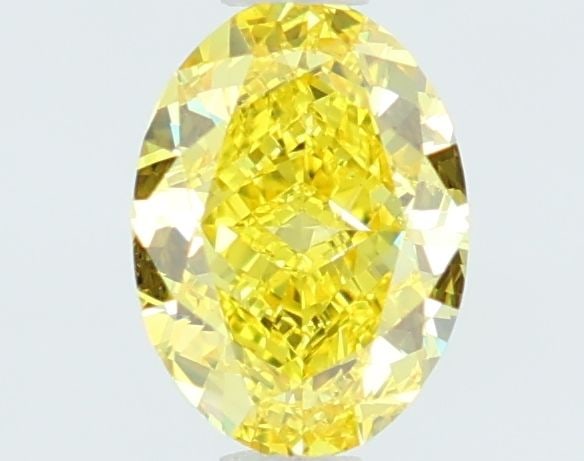 Loose Diamond - OVAL 1.01ct Fancy Vivid Yellow VS1: Loose Diamond - OVAL 1.01ct Fancy Vivid Yellow VS1 Source: This is a real non-mined Diamond that has been grown in a lab Shape: OVAL Carats: 1.01 Color: Fancy Vivid Yellow Certification: IGI Video: