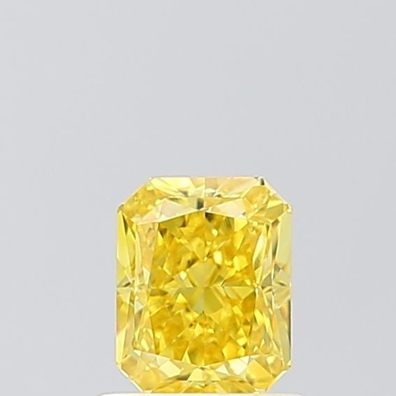 Loose Diamond - RADIANT 0.78ct Fancy Vivid Yellow VVS2: Loose Diamond - RADIANT 0.78ct Fancy Vivid Yellow VVS2 Source: This is a real non-mined Diamond that has been grown in a lab Shape: RADIANT Carats: 0.78 Color: Fancy Vivid Yellow Certification: IGI Vi