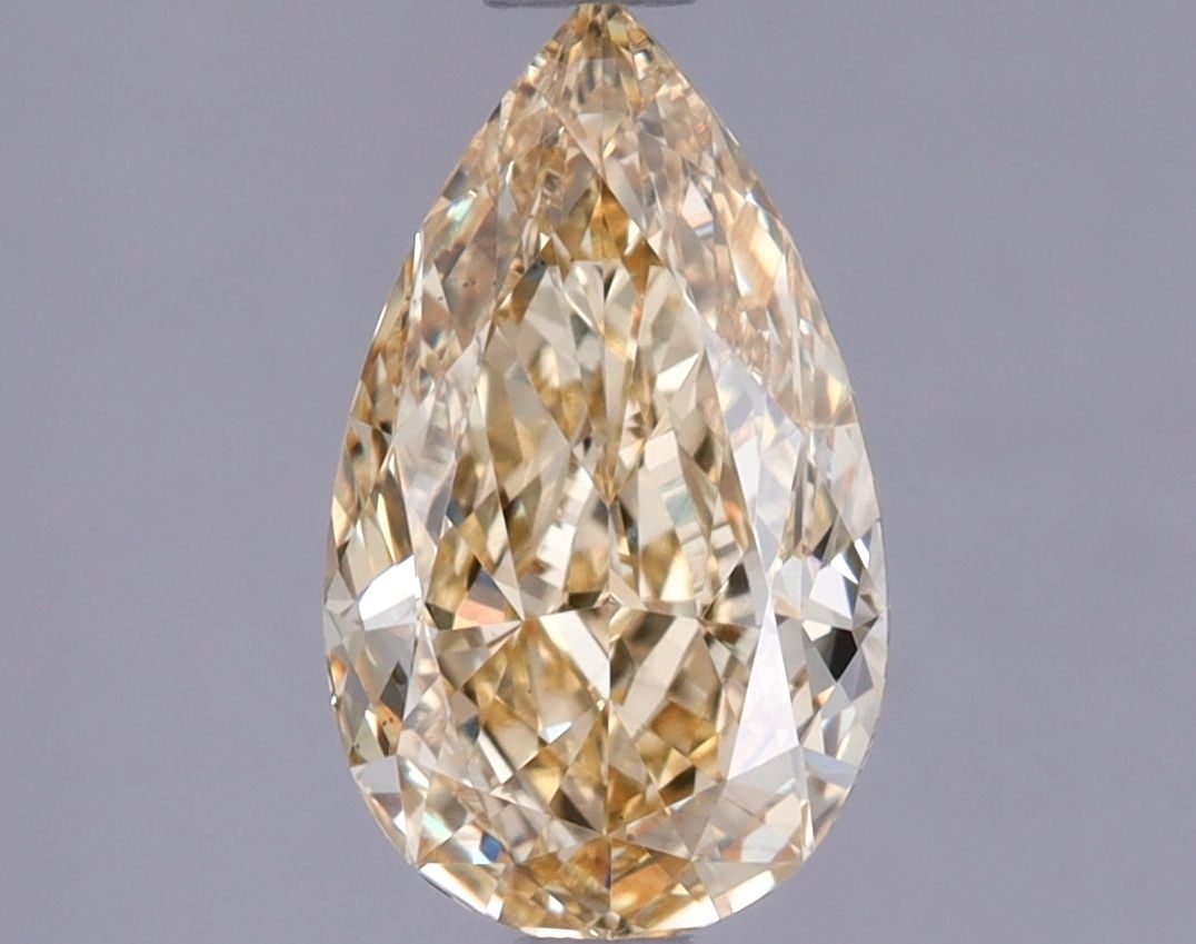 Loose Diamond - PEAR 1.23ct Fancy Intense Yellow VVS2: Loose Diamond - PEAR 1.23ct Fancy Intense Yellow VVS2 Source: This is a real non-mined Diamond that has been grown in a lab Shape: PEAR Carats: 1.23 Color: Fancy Intense Yellow Certification: IGI Vide