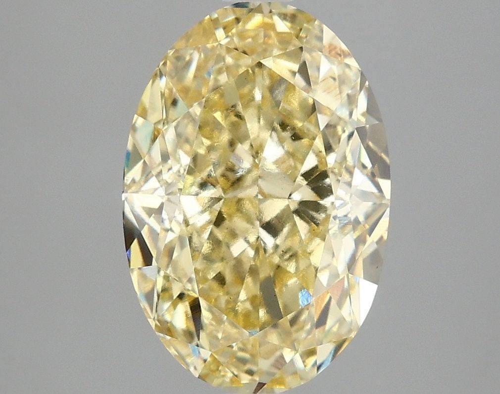 Loose Diamond - OVAL 4.06ct Fancy Intense Yellow VS1: Loose Diamond - OVAL 4.06ct Fancy Intense Yellow VS1 Source: This is a real non-mined Diamond that has been grown in a lab Shape: OVAL Carats: 4.06 Color: Fancy Intense Yellow Certification: IGI Video