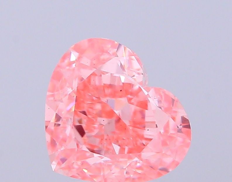 Loose Diamond - HEART 2.85ct Fancy Vivid Pink VS2: Loose Diamond - HEART 2.85ct Fancy Vivid Pink VS2 Source: This is a real non-mined Diamond that has been grown in a lab Shape: HEART Carats: 2.85 Color: Fancy Vivid Pink Certification: IGI Video: