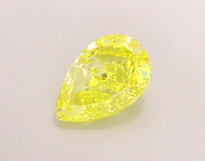 Loose Diamond - PEAR 1.06ct Fancy Vivid Yellow VS1: Loose Diamond - PEAR 1.06ct Fancy Vivid Yellow VS1 Source: This is a real non-mined Diamond that has been grown in a lab Shape: PEAR Carats: 1.06 Color: Fancy Vivid Yellow Certification: IGI Video: