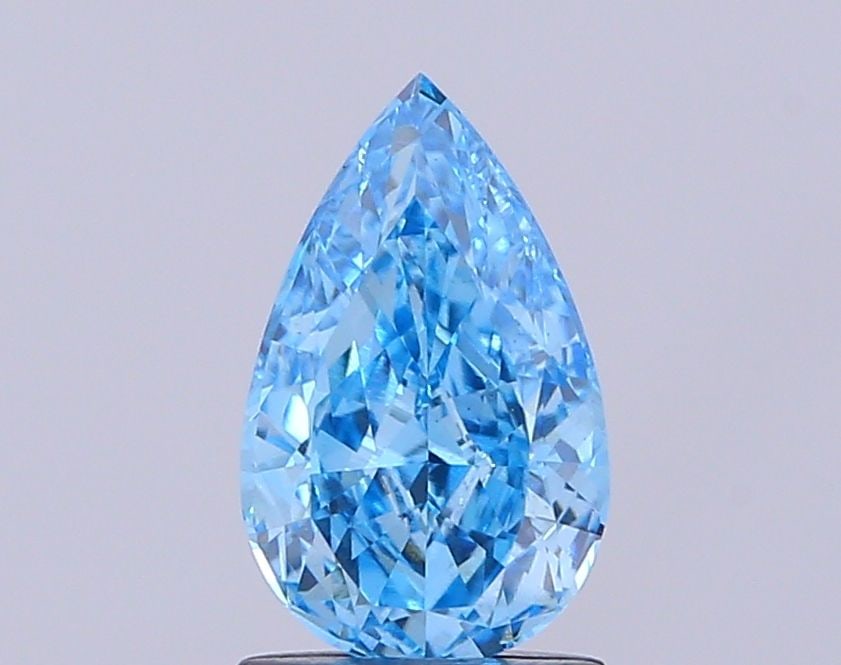 Loose Diamond - PEAR 1.44ct Fancy Vivid Blue VS1: Loose Diamond - PEAR 1.44ct Fancy Vivid Blue VS1 Source: This is a real non-mined Diamond that has been grown in a lab Shape: PEAR Carats: 1.44 Color: Fancy Vivid Blue Certification: IGI Video: Video