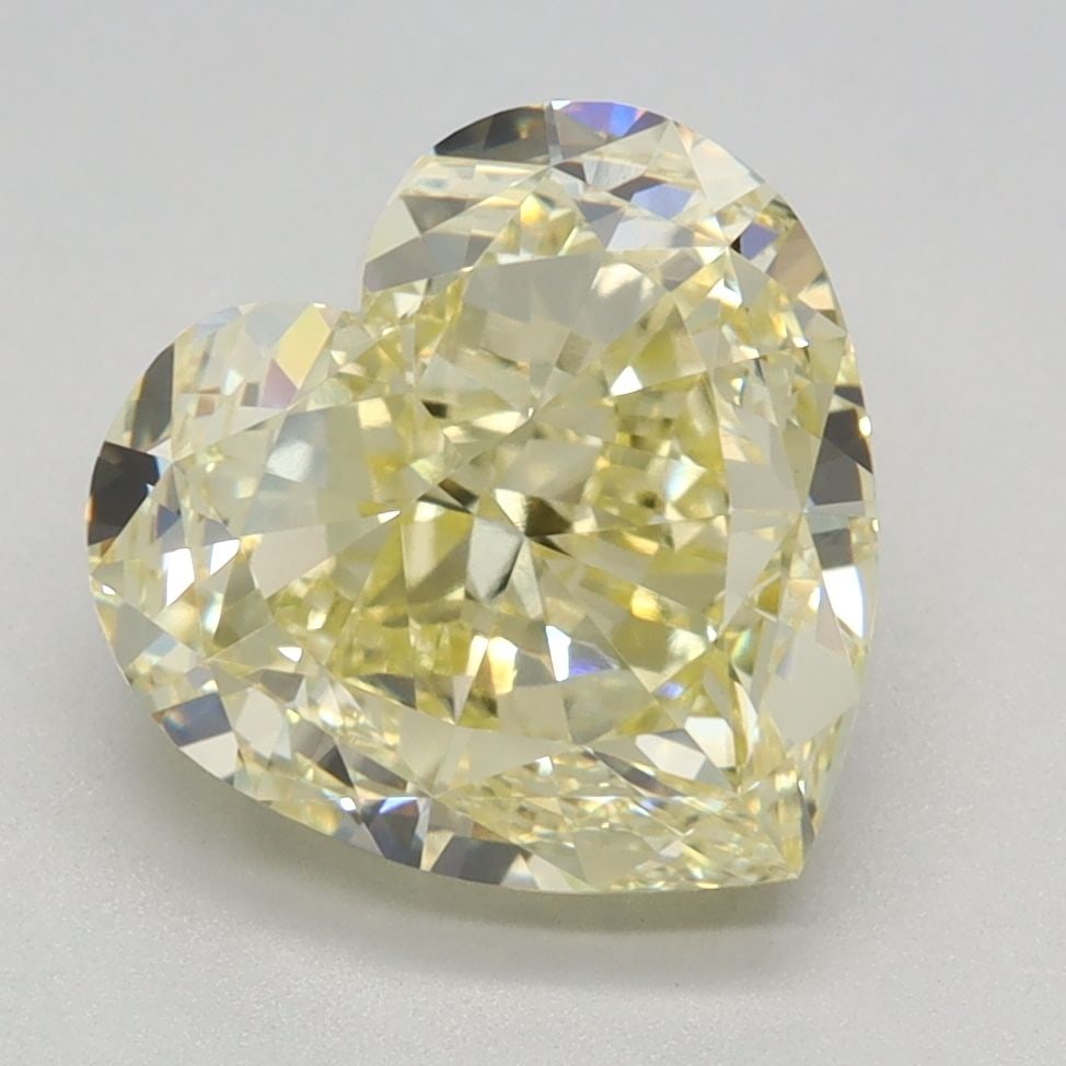 Loose Diamond - HEART 3.14ct Fancy Light Yellow VVS2: Loose Diamond - HEART 3.14ct Fancy Light Yellow VVS2 Source: This is a real non-mined Diamond that has been grown in a lab Shape: HEART Carats: 3.14 Color: Fancy Light Yellow Certification: IGI Video:
