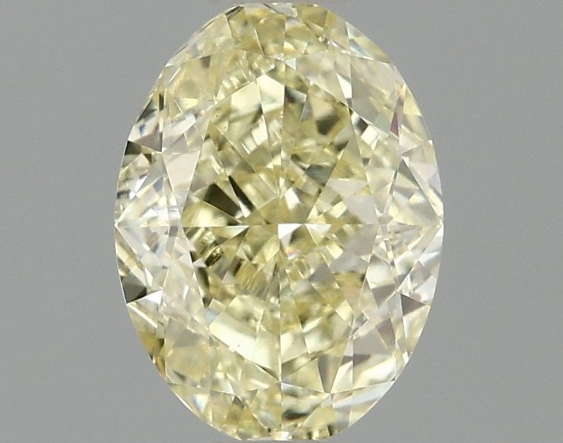 Loose Diamond - OVAL 1.01ct Fancy Intense Yellow VVS2: Loose Diamond - OVAL 1.01ct Fancy Intense Yellow VVS2 Source: This is a real non-mined Diamond that has been grown in a lab Shape: OVAL Carats: 1.01 Color: Fancy Intense Yellow Certification: IGI Vide