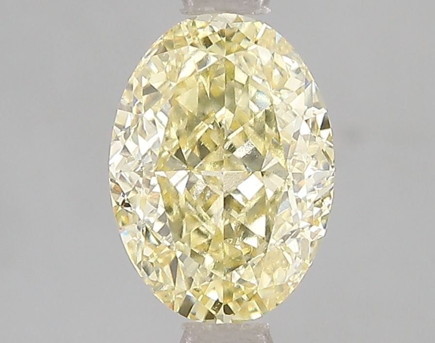 Loose Diamond - OVAL 2.01ct Fancy Intense Yellow VS1: Loose Diamond - OVAL 2.01ct Fancy Intense Yellow VS1 Source: This is a real non-mined Diamond that has been grown in a lab Shape: OVAL Carats: 2.01 Color: Fancy Intense Yellow Certification: IGI Video