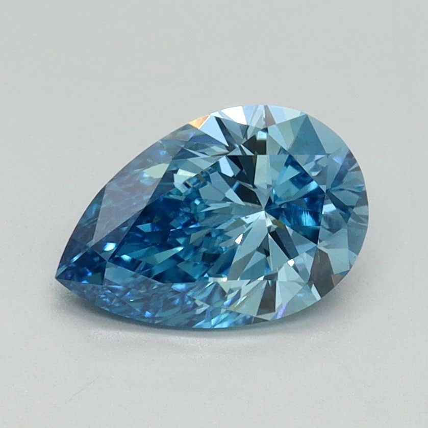Loose Diamond - PEAR 1.03ct Fancy Vivid Blue VS1: Loose Diamond - PEAR 1.03ct Fancy Vivid Blue VS1 Source: This is a real non-mined Diamond that has been grown in a lab Shape: PEAR Carats: 1.03 Color: Fancy Vivid Blue Certification: IGI Video: