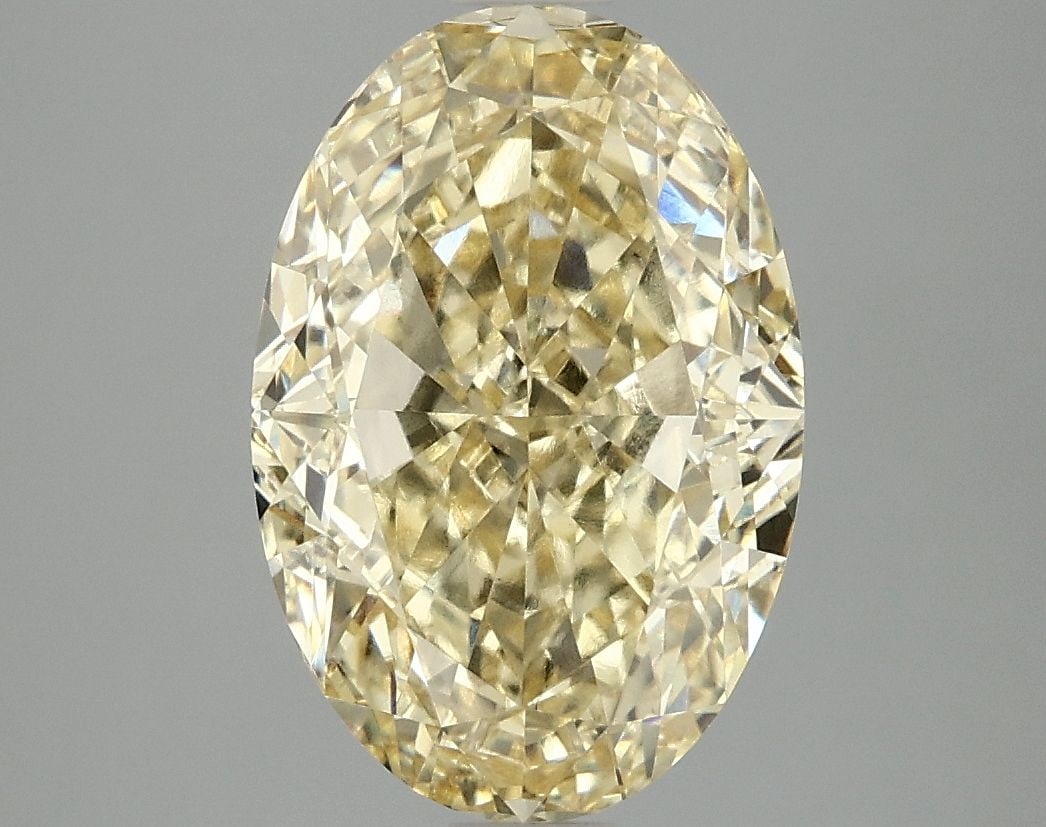 Loose Diamond - OVAL 4.09ct Fancy Intense Yellow VS1: Loose Diamond - OVAL 4.09ct Fancy Intense Yellow VS1 Source: This is a real non-mined Diamond that has been grown in a lab Shape: OVAL Carats: 4.09 Color: Fancy Intense Yellow Certification: IGI Video