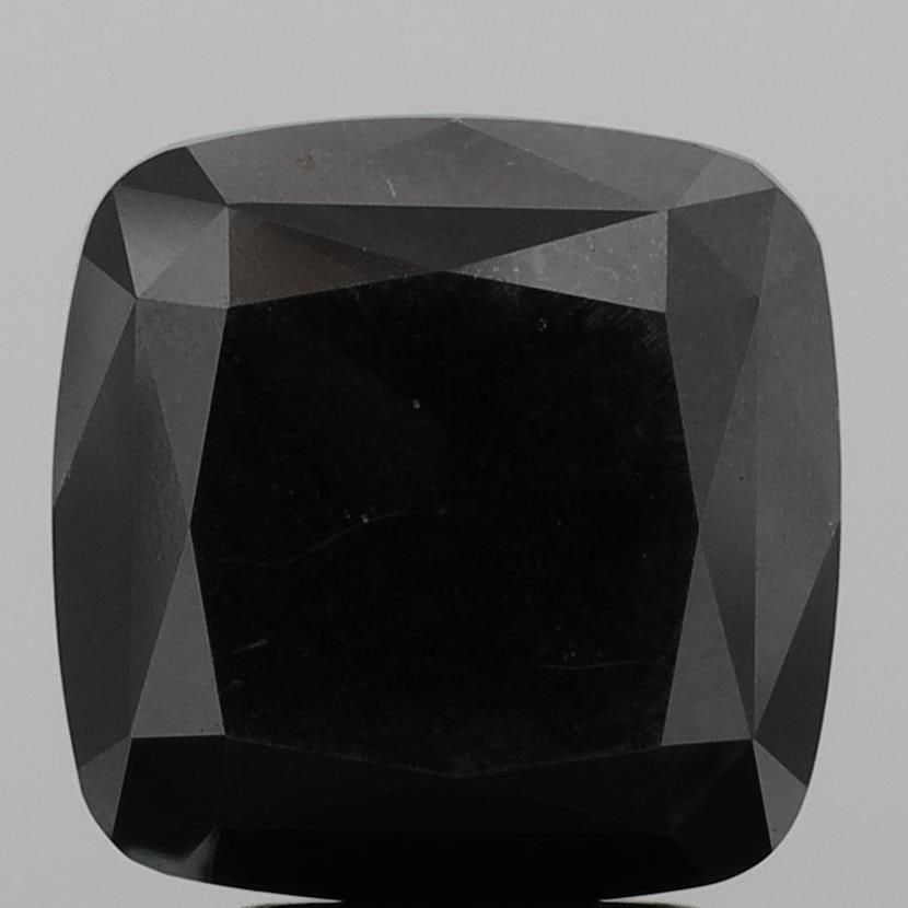 Loose Diamond - CUSHION MODIFIED 4.58ct Fancy Black: Loose Diamond - CUSHION MODIFIED 4.58ct Fancy Black Source: This is a real non-mined Diamond that has been grown in a lab Shape: CUSHION MODIFIED Carats: 4.58 Color: Fancy Black Certification: IGI Vid