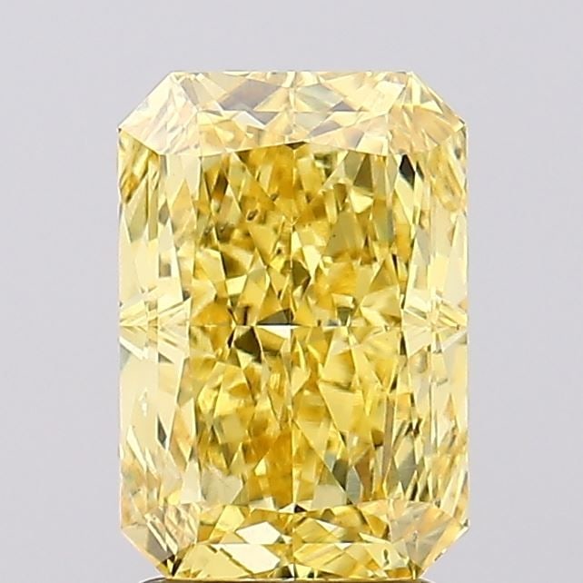 Loose Diamond - RADIANT 2.85ct Fancy Vivid Yellow SI1: Loose Diamond - RADIANT 2.85ct Fancy Vivid Yellow SI1 Source: This is a real non-mined Diamond that has been grown in a lab Shape: RADIANT Carats: 2.85 Color: Fancy Vivid Yellow Certification: IGI Vid