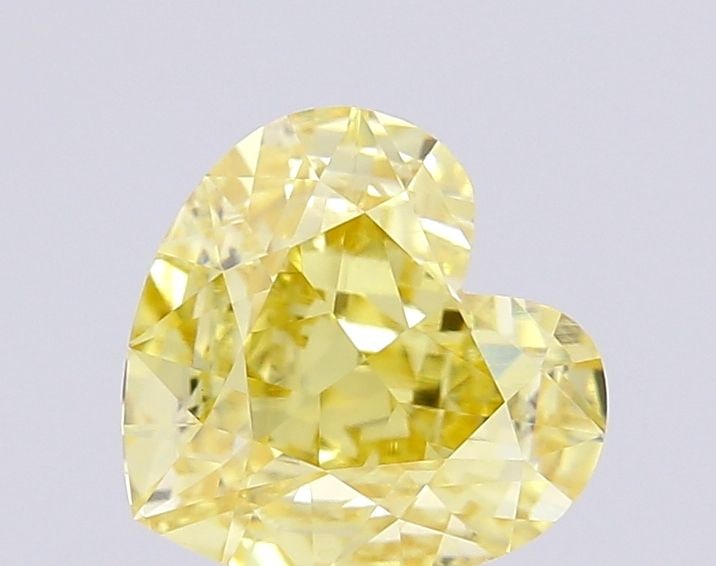 Loose Diamond - HEART 1.47ct Fancy Intense Yellow VS1: Loose Diamond - HEART 1.47ct Fancy Intense Yellow VS1 Source: This is a real non-mined Diamond that has been grown in a lab Shape: HEART Carats: 1.47 Color: Fancy Intense Yellow Certification: IGI Vid