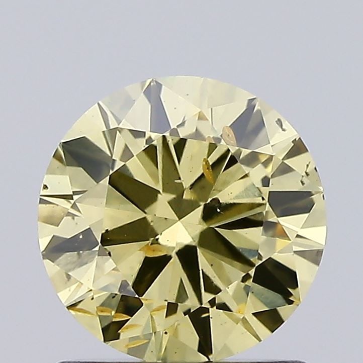 Loose Diamond - ROUND 1.13ct Fancy Vivid Yellowish Yellow SI2: Loose Diamond - ROUND 1.13ct Fancy Vivid Yellowish Yellow SI2 Source: This is a real non-mined Diamond that has been grown in a lab Shape: ROUND Carats: 1.13 Color: Fancy Vivid Yellowish Yellow Certif