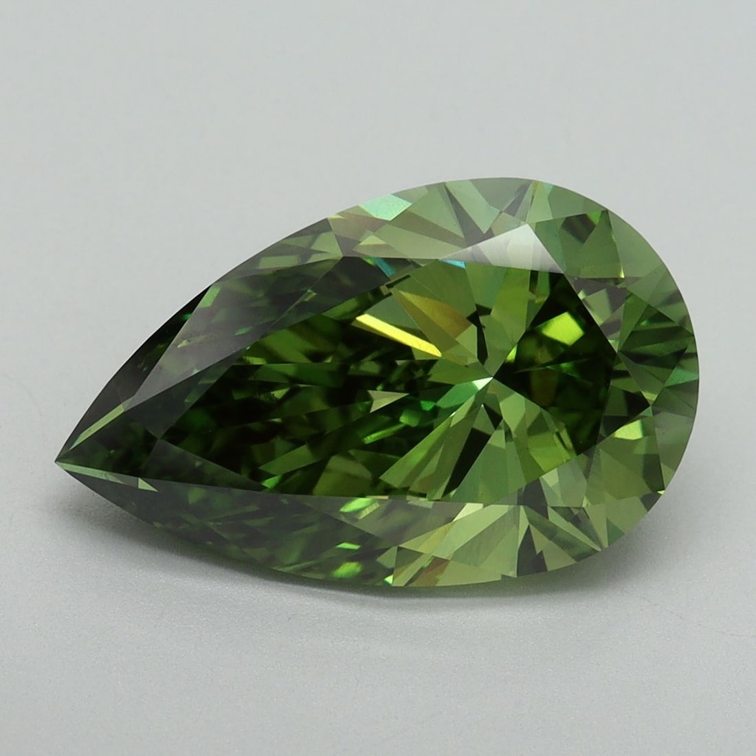 Loose Diamond - PEAR 5.03ct Fancy Vivid Green VS2: Loose Diamond - PEAR 5.03ct Fancy Vivid Green VS2 Source: This is a real non-mined Diamond that has been grown in a lab Shape: PEAR Carats: 5.03 Color: Fancy Vivid Green Certification: IGI Video: