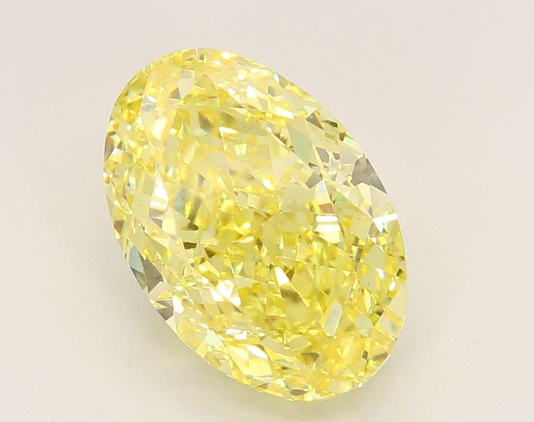 Loose Diamond - OVAL 4.09ct Fancy Vivid Yellow VS1: Loose Diamond - OVAL 4.09ct Fancy Vivid Yellow VS1 Source: This is a real non-mined Diamond that has been grown in a lab Shape: OVAL Carats: 4.09 Color: Fancy Vivid Yellow Certification: IGI Video: