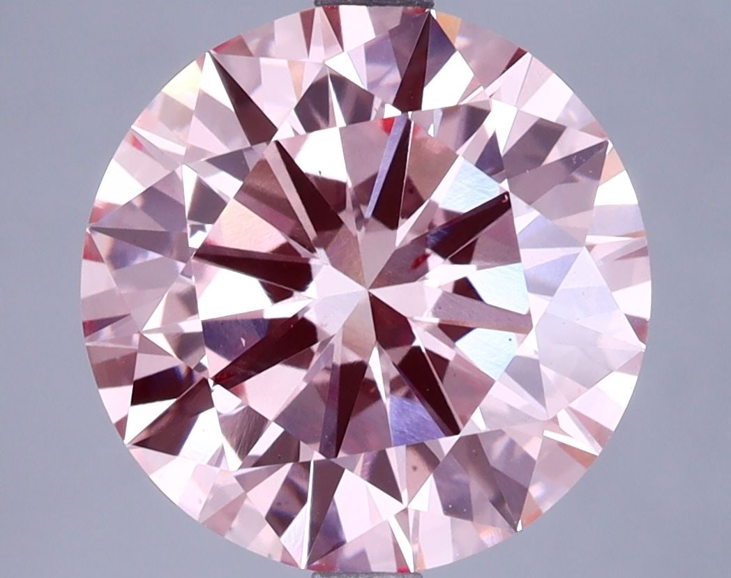 Loose Diamond - ROUND 5.01ct Fancy Intense Pink VS2: Loose Diamond - ROUND 5.01ct Fancy Intense Pink VS2 Source: This is a real non-mined Diamond that has been grown in a lab Shape: ROUND Carats: 5.01 Color: Fancy Intense Pink Certification: IGI Video: