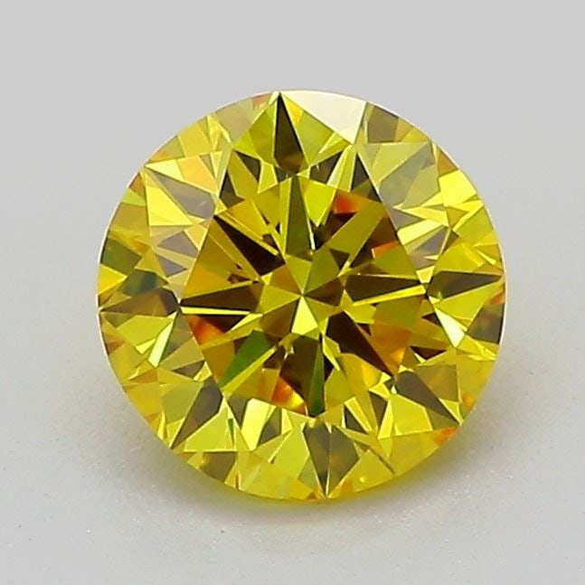 Loose Diamond - ROUND 1.01ct Fancy Vivid Yellow VVS2: Loose Diamond - ROUND 1.01ct Fancy Vivid Yellow VVS2 Source: This is a real non-mined Diamond that has been grown in a lab Shape: ROUND Carats: 1.01 Color: Fancy Vivid Yellow Certification: IGI Video: