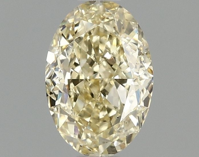 Loose Diamond - OVAL 1.08ct Fancy Intense Yellow VS1: Loose Diamond - OVAL 1.08ct Fancy Intense Yellow VS1 Source: This is a real non-mined Diamond that has been grown in a lab Shape: OVAL Carats: 1.08 Color: Fancy Intense Yellow Certification: IGI Video