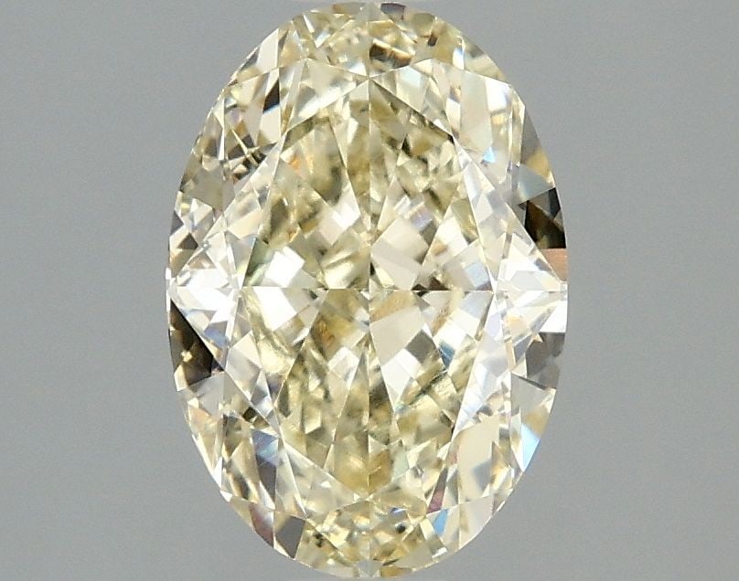 Loose Diamond - OVAL 2.1ct Fancy Yellow VVS2: Loose Diamond - OVAL 2.1ct Fancy Yellow VVS2 Source: This is a real non-mined Diamond that has been grown in a lab Shape: OVAL Carats: 2.1 Color: Fancy Yellow Certification: IGI Video: