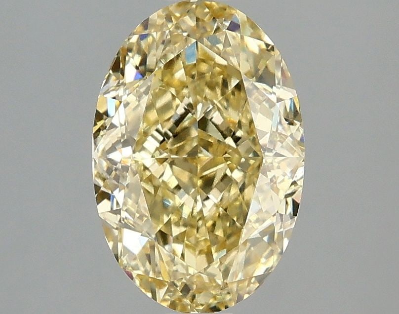 Loose Diamond - OVAL 2.08ct Fancy Vivid Yellow VS1: Loose Diamond - OVAL 2.08ct Fancy Vivid Yellow VS1 Source: This is a real non-mined Diamond that has been grown in a lab Shape: OVAL Carats: 2.08 Color: Fancy Vivid Yellow Certification: IGI Video: