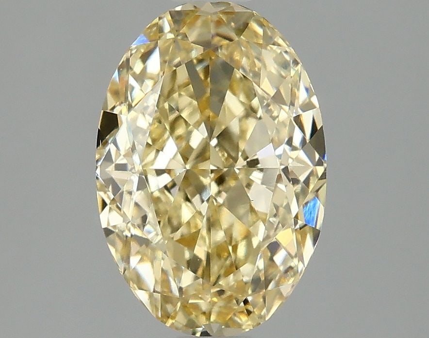 Loose Diamond - OVAL 2.09ct Fancy Intense Yellow VS1: Loose Diamond - OVAL 2.09ct Fancy Intense Yellow VS1 Source: This is a real non-mined Diamond that has been grown in a lab Shape: OVAL Carats: 2.09 Color: Fancy Intense Yellow Certification: IGI Video