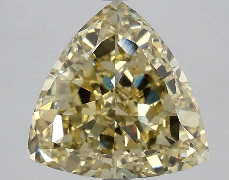 Loose Diamond - TRIANGULAR 3.1ct Fancy Yellow VS1: Loose Diamond - TRIANGULAR 3.1ct Fancy Yellow VS1 Source: This is a real non-mined Diamond that has been grown in a lab Shape: TRIANGULAR Carats: 3.1 Color: Fancy Yellow Certification: IGI Video: