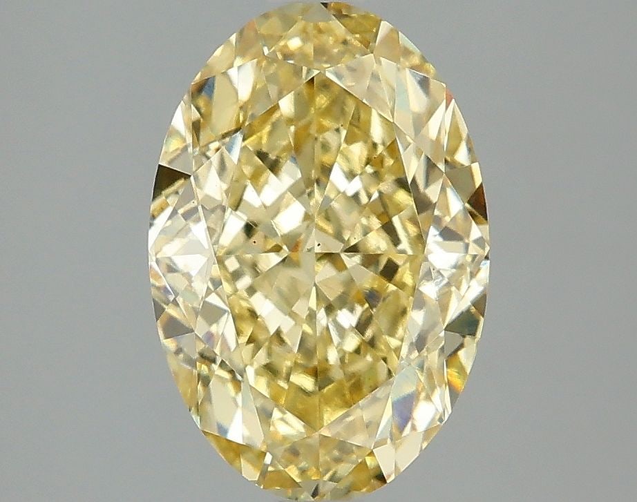 Loose Diamond - OVAL 3.06ct Fancy Intense Yellow VS1: Loose Diamond - OVAL 3.06ct Fancy Intense Yellow VS1 Source: This is a real non-mined Diamond that has been grown in a lab Shape: OVAL Carats: 3.06 Color: Fancy Intense Yellow Certification: IGI Video