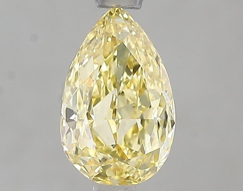 Loose Diamond - PEAR 1.07ct Fancy Intense Yellow VVS2: Loose Diamond - PEAR 1.07ct Fancy Intense Yellow VVS2 Source: This is a real non-mined Diamond that has been grown in a lab Shape: PEAR Carats: 1.07 Color: Fancy Intense Yellow Certification: IGI Vide