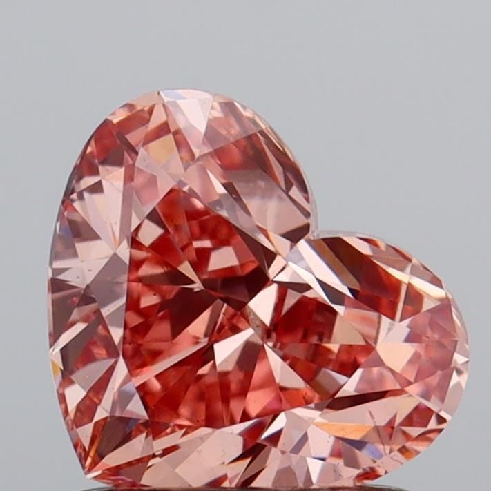 Loose Diamond - HEART 1.1ct Fancy Vivid Pink VS2: Loose Diamond - HEART 1.1ct Fancy Vivid Pink VS2 Source: This is a real non-mined Diamond that has been grown in a lab Shape: HEART Carats: 1.1 Color: Fancy Vivid Pink Certification: IGI Video: