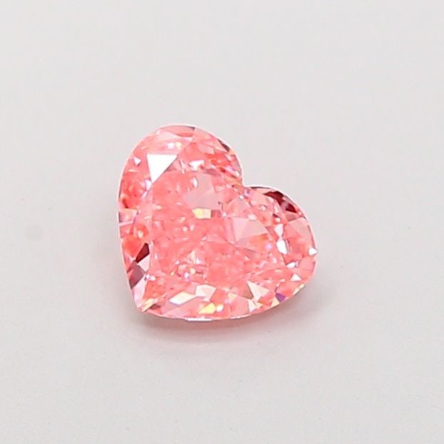 Loose Diamond - HEART 0.88ct Fancy Vivid Pink VS1: Loose Diamond - HEART 0.88ct Fancy Vivid Pink VS1 Source: This is a real non-mined Diamond that has been grown in a lab Shape: HEART Carats: 0.88 Color: Fancy Vivid Pink Certification: IGI Video: