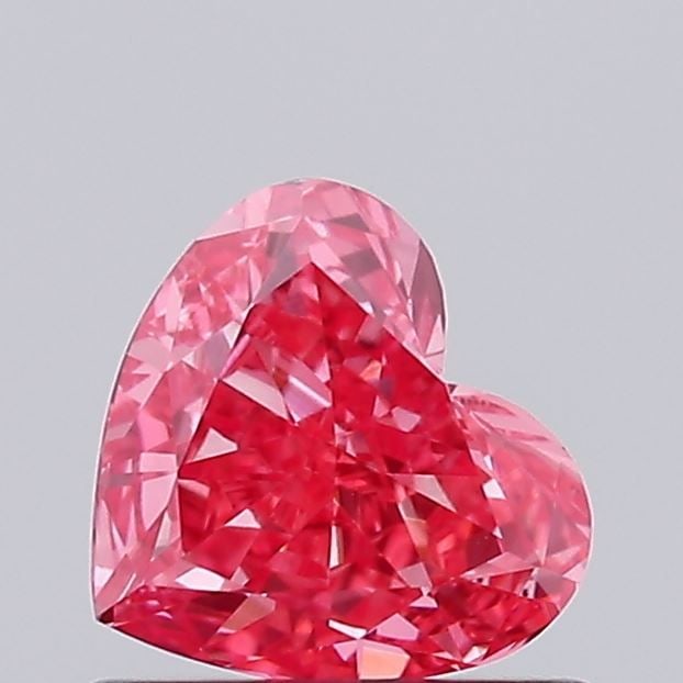 Loose Diamond - HEART 0.64ct Fancy Vivid Pink VVS2: Loose Diamond - HEART 0.64ct Fancy Vivid Pink VVS2 Source: This is a real non-mined Diamond that has been grown in a lab Shape: HEART Carats: 0.64 Color: Fancy Vivid Pink Certification: IGI Video: