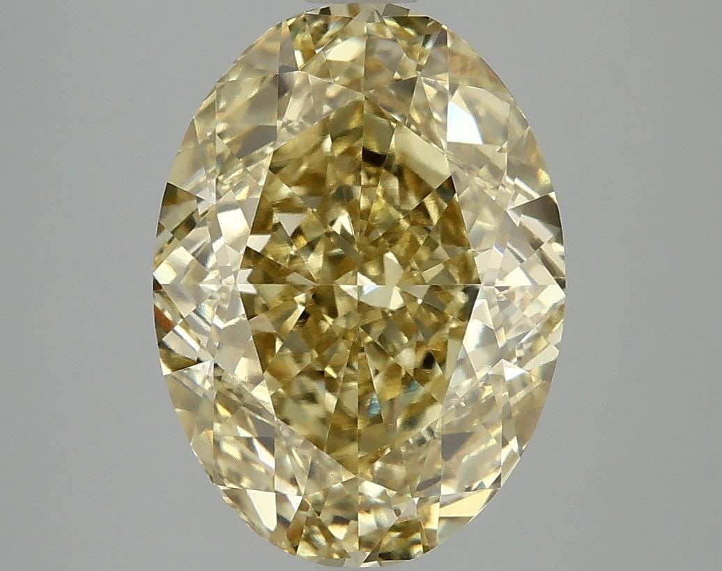 Loose Diamond - OVAL 5.1ct Fancy Vivid Yellow VVS2: Loose Diamond - OVAL 5.1ct Fancy Vivid Yellow VVS2 Source: This is a real non-mined Diamond that has been grown in a lab Shape: OVAL Carats: 5.1 Color: Fancy Vivid Yellow Certification: IGI Video: