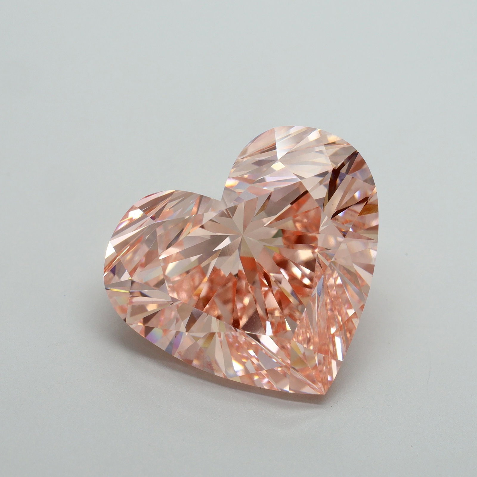 Loose Diamond - HEART 21.09ct Fancy Vivid Pink VVS2: Loose Diamond - HEART 21.09ct Fancy Vivid Pink VVS2 Source: This is a real non-mined Diamond that has been grown in a lab Shape: HEART Carats: 21.09 Color: Fancy Vivid Pink Certification: IGI Video: