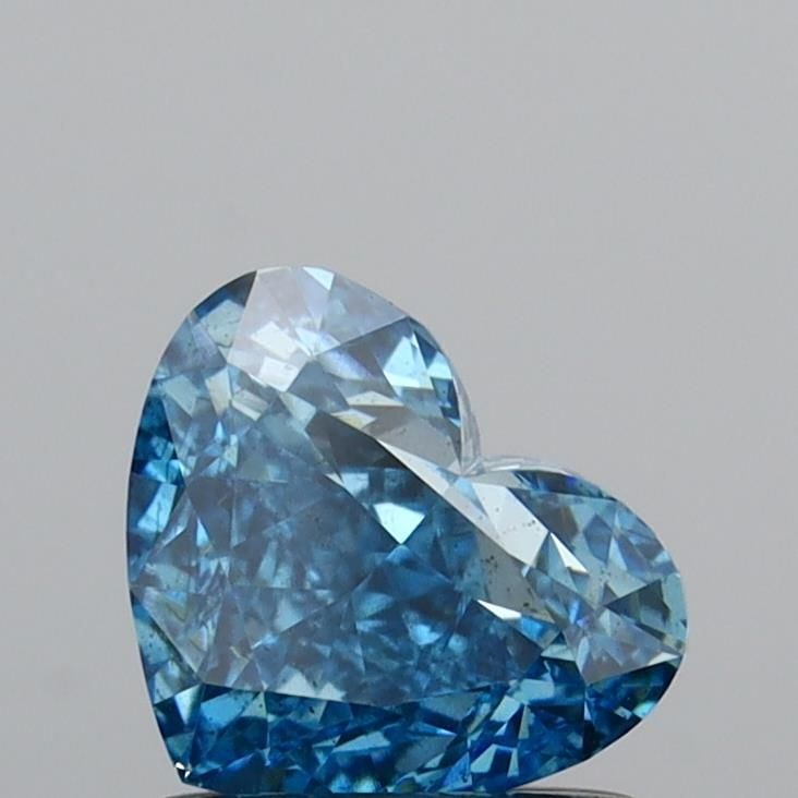 Loose Diamond - HEART 1.0ct Fancy Vivid Blue SI1: Loose Diamond - HEART 1.0ct Fancy Vivid Blue SI1 Source: This is a real non-mined Diamond that has been grown in a lab Shape: HEART Carats: 1.0 Color: Fancy Vivid Blue Certification: IGI Video: