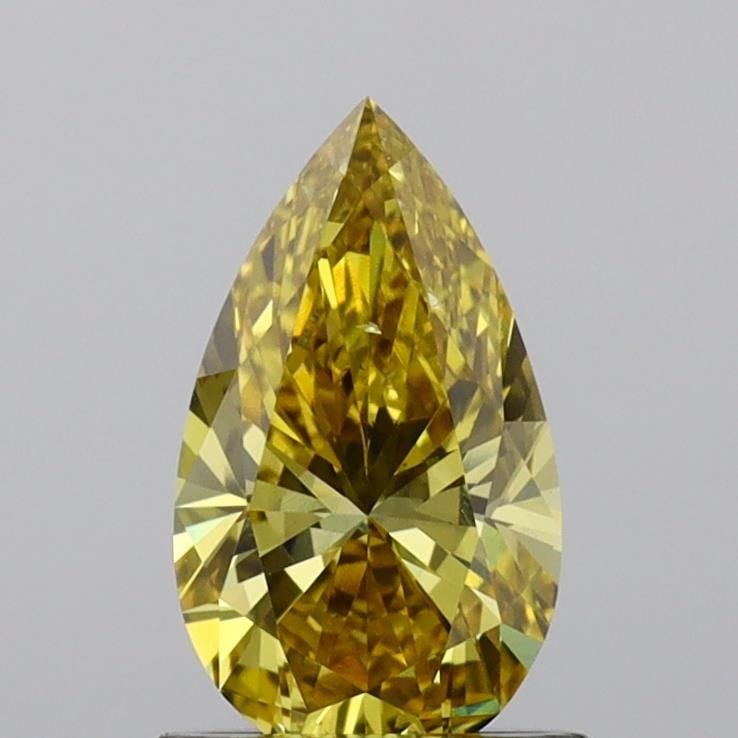 Loose Diamond - PEAR 1.0ct Fancy Vivid Yellow VS2: Loose Diamond - PEAR 1.0ct Fancy Vivid Yellow VS2 Source: This is a real non-mined Diamond that has been grown in a lab Shape: PEAR Carats: 1.0 Color: Fancy Vivid Yellow Certification: IGI Video: