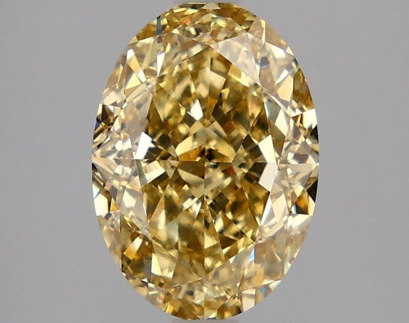 Loose Diamond - OVAL 2.99ct Fancy Intense Yellow VS1: Loose Diamond - OVAL 2.99ct Fancy Intense Yellow VS1 Source: This is a real non-mined Diamond that has been grown in a lab Shape: OVAL Carats: 2.99 Color: Fancy Intense Yellow Certification: IGI Video