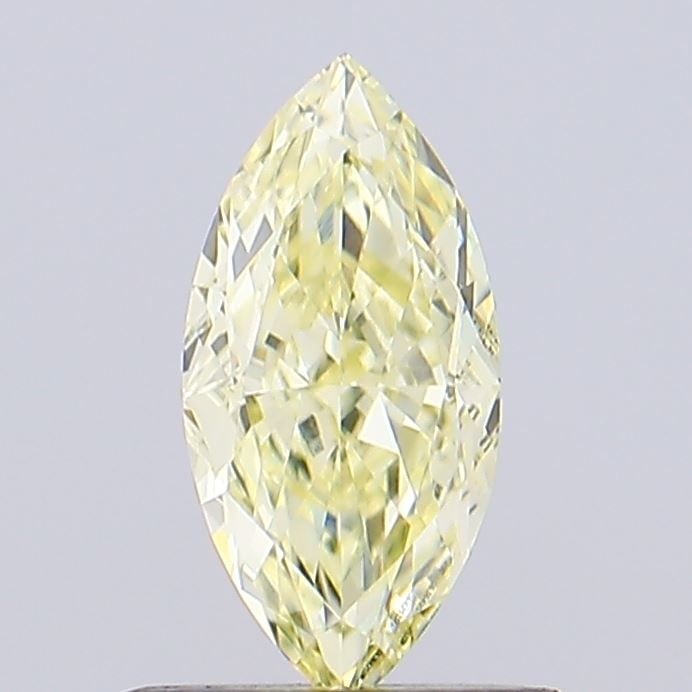 Loose Diamond - MARQUISE 0.7ct Fancy Yellow VVS2: Loose Diamond - MARQUISE 0.7ct Fancy Yellow VVS2 Source: This is a real non-mined Diamond that has been grown in a lab Shape: MARQUISE Carats: 0.7 Color: Fancy Yellow Certification: IGI Video: