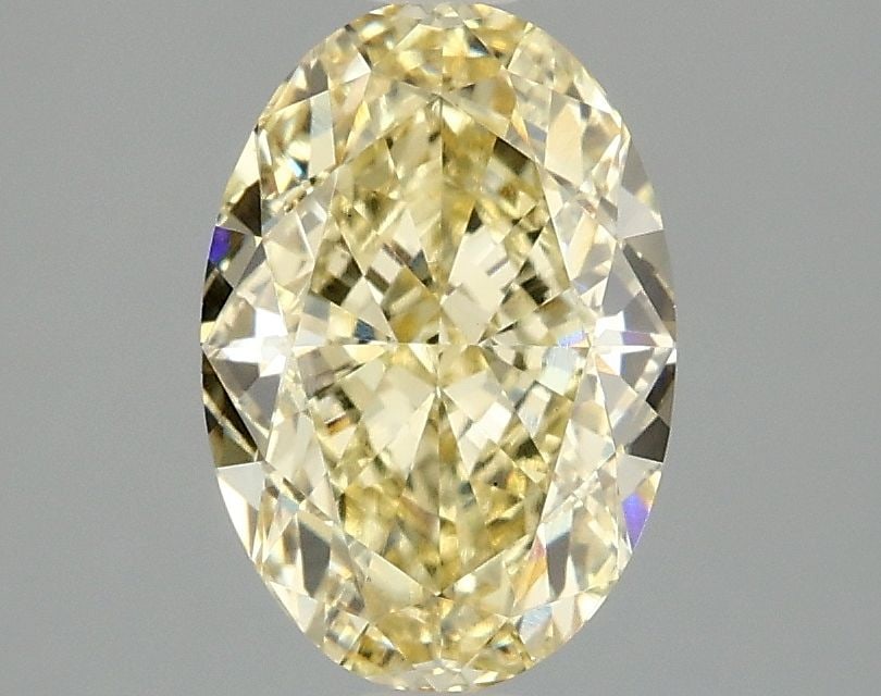 Loose Diamond - OVAL 2.1ct Fancy Yellow VS1: Loose Diamond - OVAL 2.1ct Fancy Yellow VS1 Source: This is a real non-mined Diamond that has been grown in a lab Shape: OVAL Carats: 2.1 Color: Fancy Yellow Certification: IGI Video:
